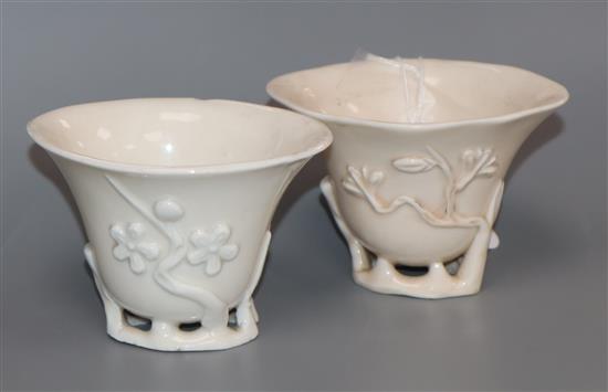 Two 17th / 18th century Chinese blanc de chine prunus libation cups